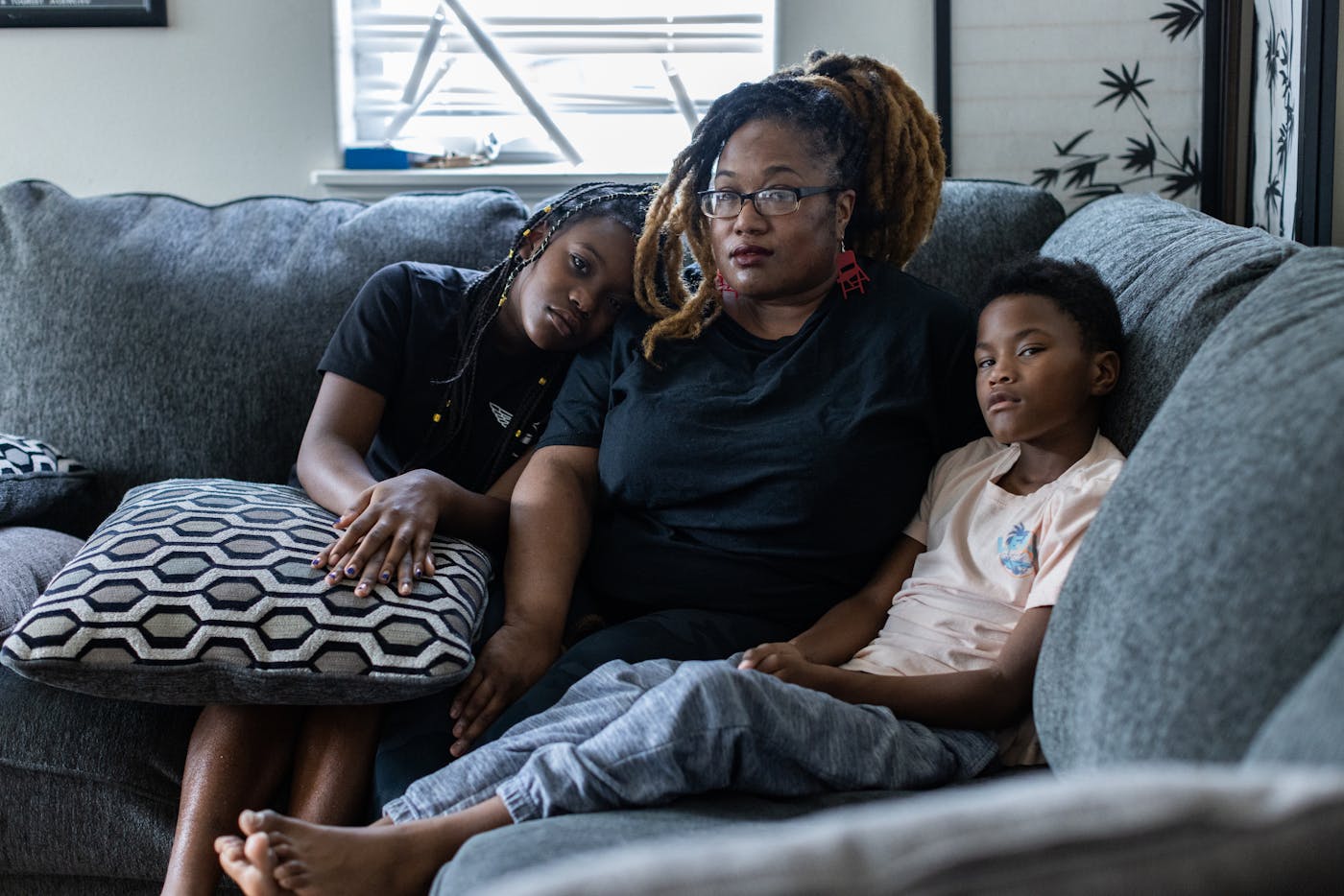 Community organizer and business owner Jasmin Smith is pictured here with her twins) in her home in Anchorage, Alaska 