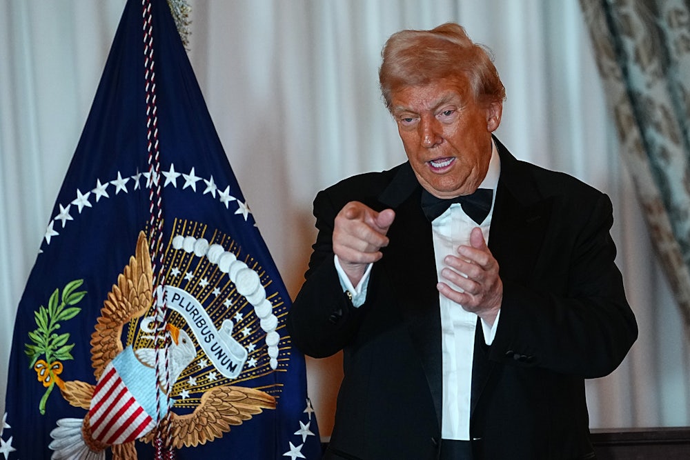 Donald Trump gestures after delivering remarks at the State Department Kennedy Center Honors medal presentation.