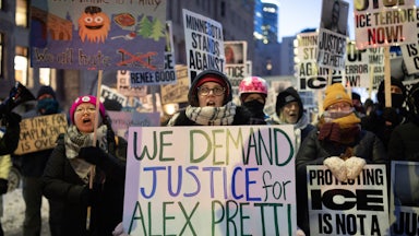 A person holds a sign that says, "We demand justice for Alex Pretti" during a protest in Minneapolis against ICE's presence in Minnesota