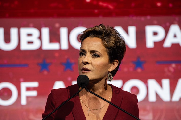 Kari Lake speaking at a lectern