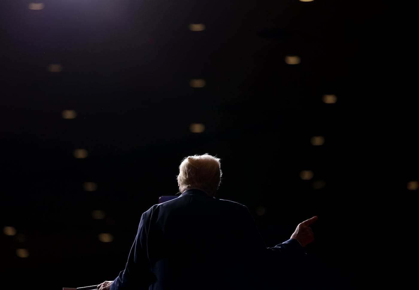 Donald Trump photographed from behind 