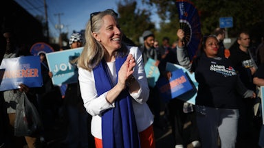 Virginia Democratic gubernatorial candidate Abigail Spanberger walking in a parade on the campaign trail