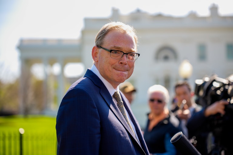 National Economic Council head Kevin Hassett presses his lips together while speaking to reporters outside the White House