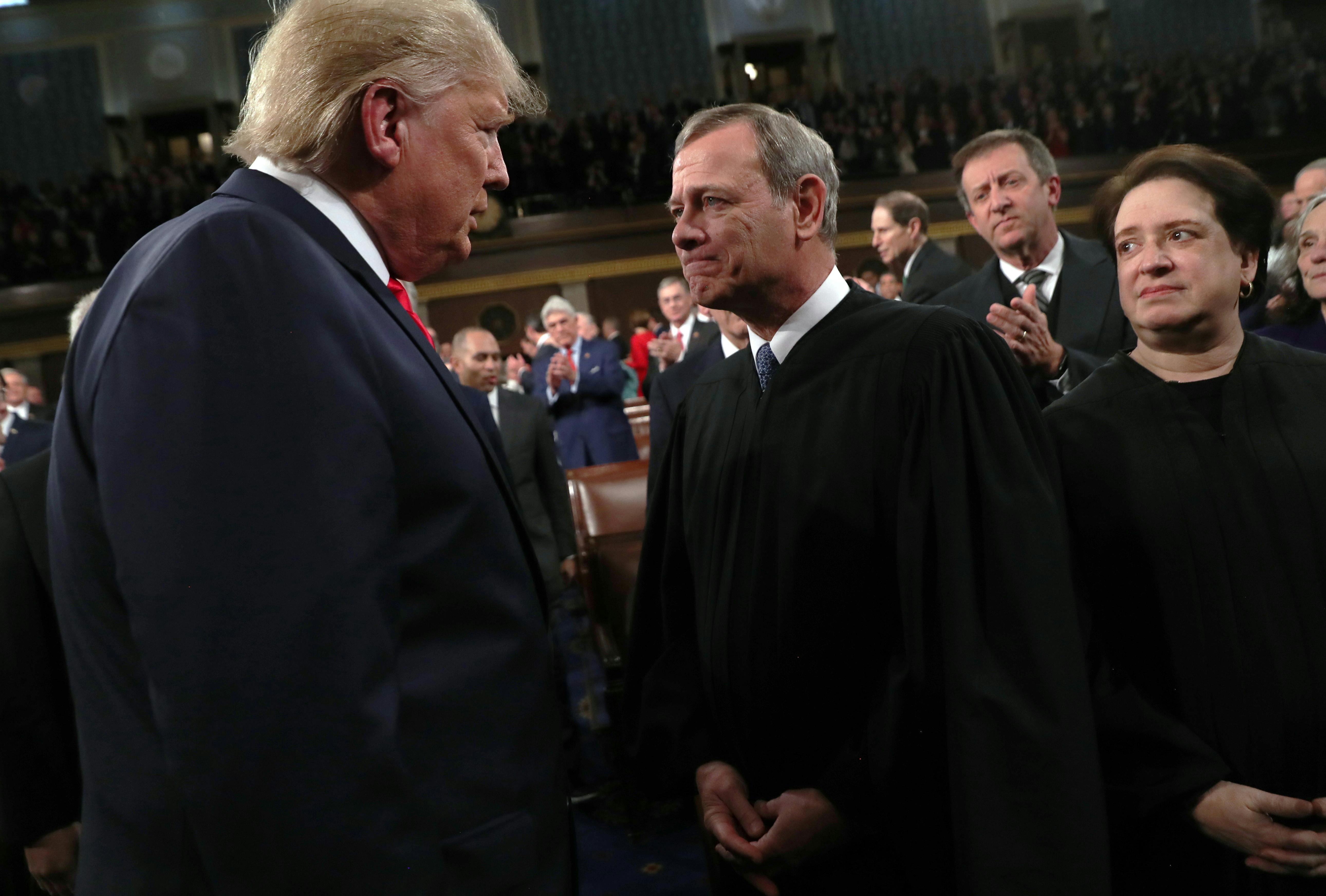 Trump with Supreme Court Chief Justice John Roberts at the State of the Union address
