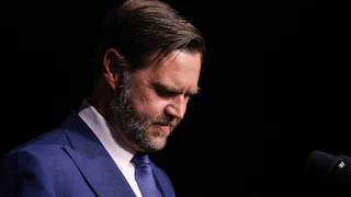 Vice President JD Vance looks down during an event in Budapest, Hungary