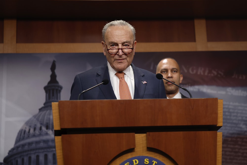 Charles Schumer Hakeem Jeffries speak at a press conference.