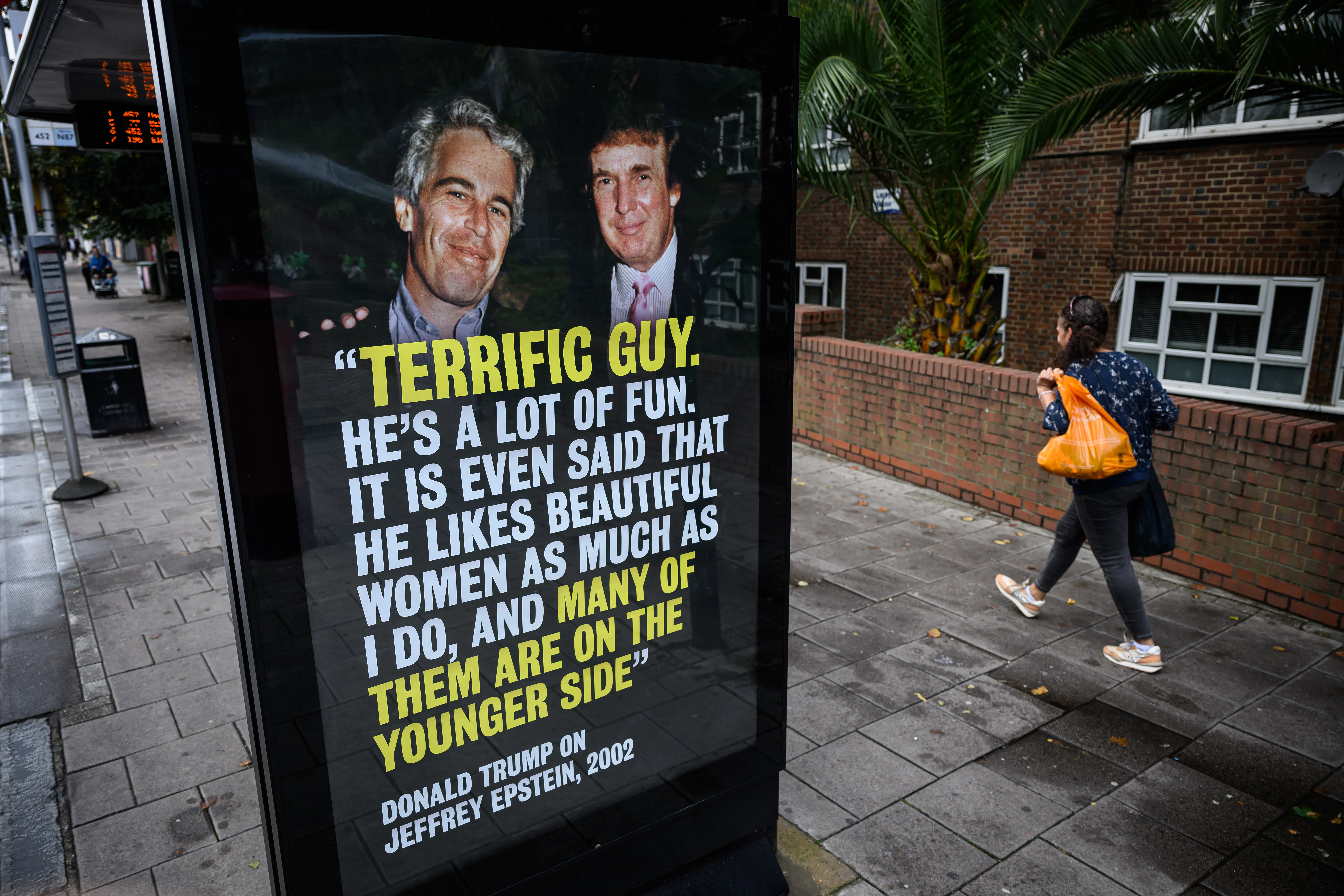 photo of Donald Trump and Jeffrey Epstein at a bus stop