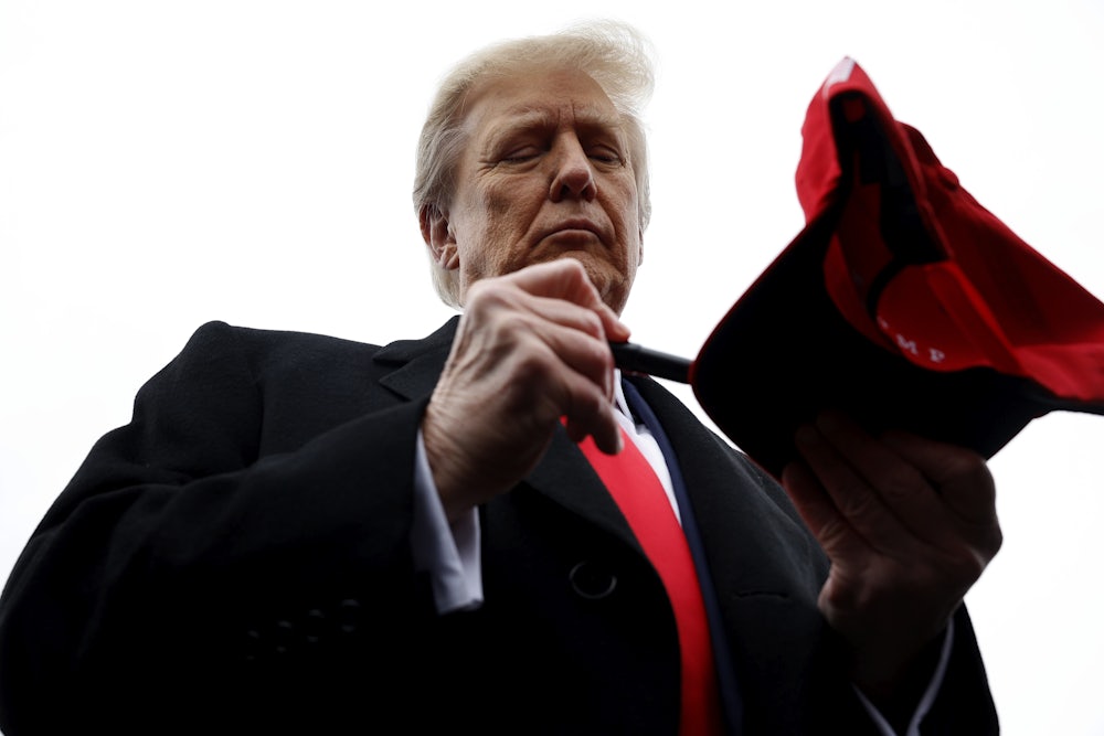 Trump autographed hats on Tuesday