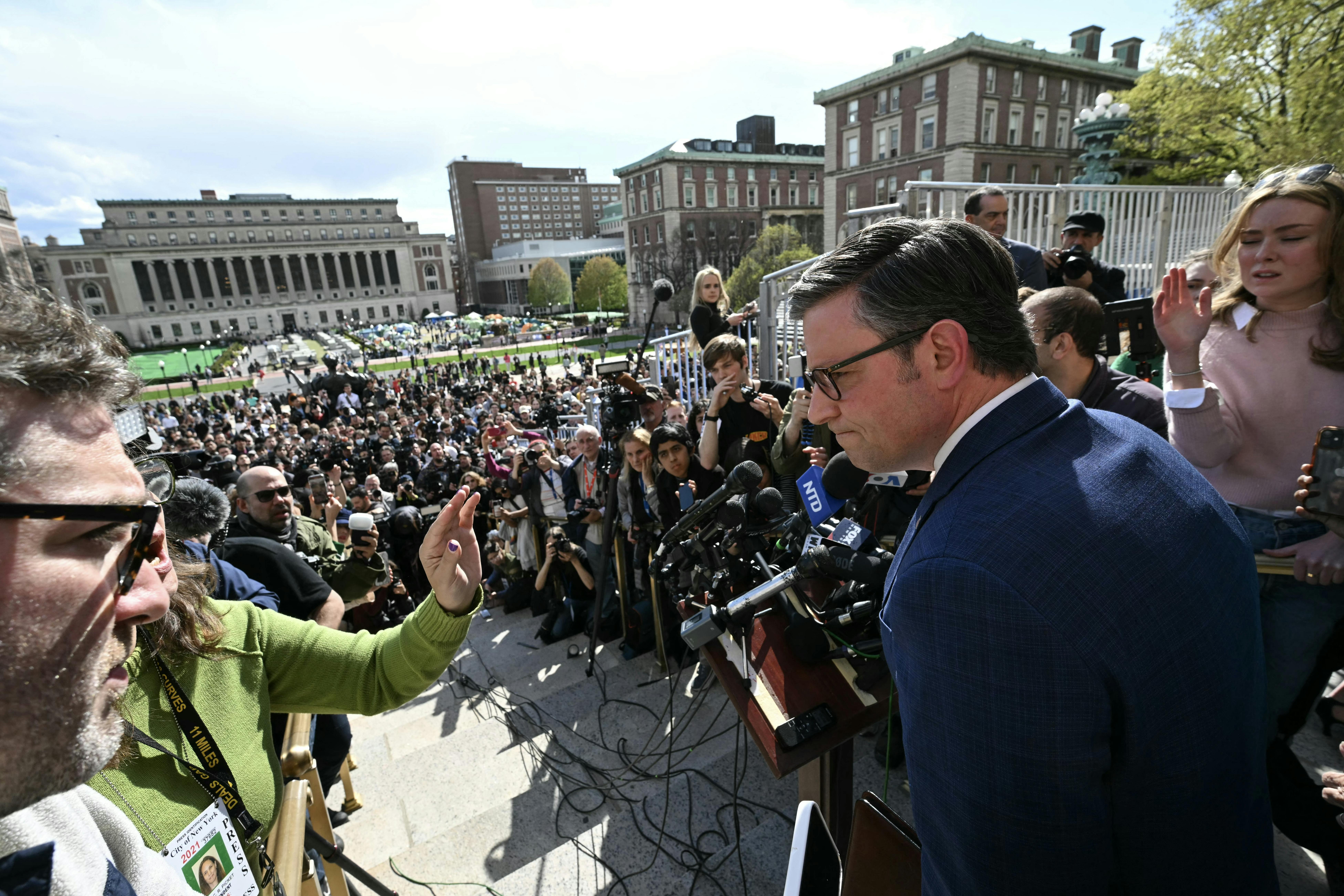 Mike Johnson takes questions from reporters doing a visit to a student protest at Columbia University. 