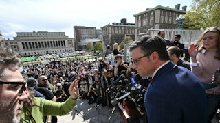 Mike Johnson takes questions from reporters doing a visit to a student protest at Columbia University.