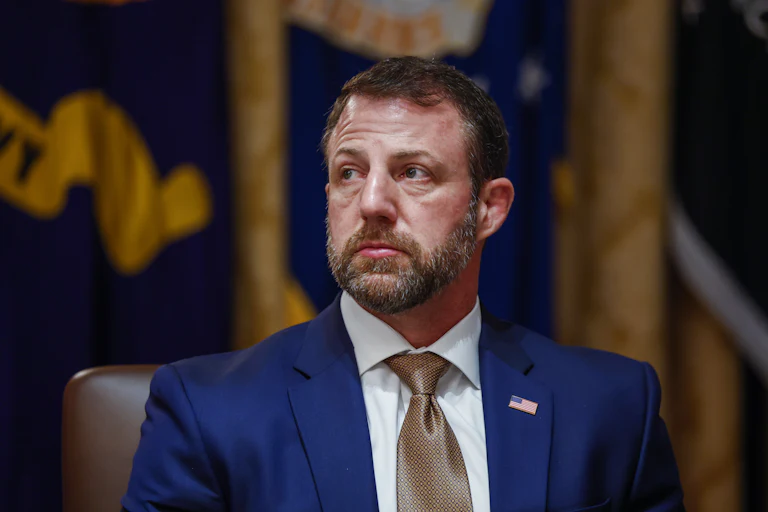 Homeland Security Secretary Markwayne Mullin sits in Donald Trump’s Cabinet meeting