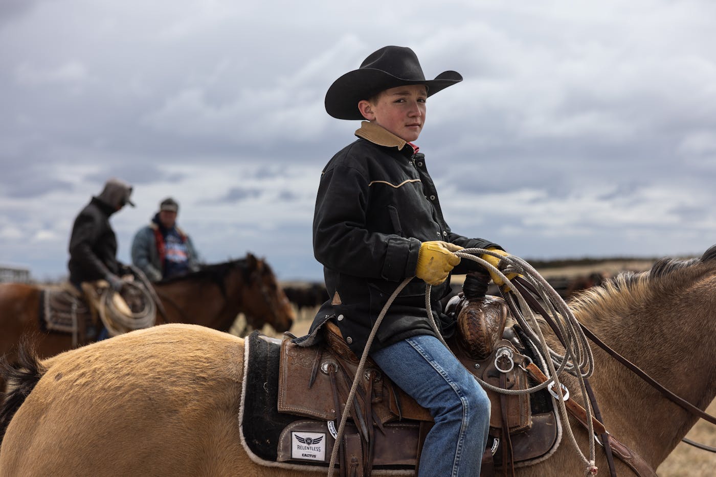 Photo of a boy on horseback. 