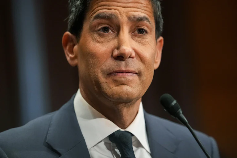 Federal Reserve chair nominee Kevin Warsh raises his eyebrows during his Senate committee confirmation hearing