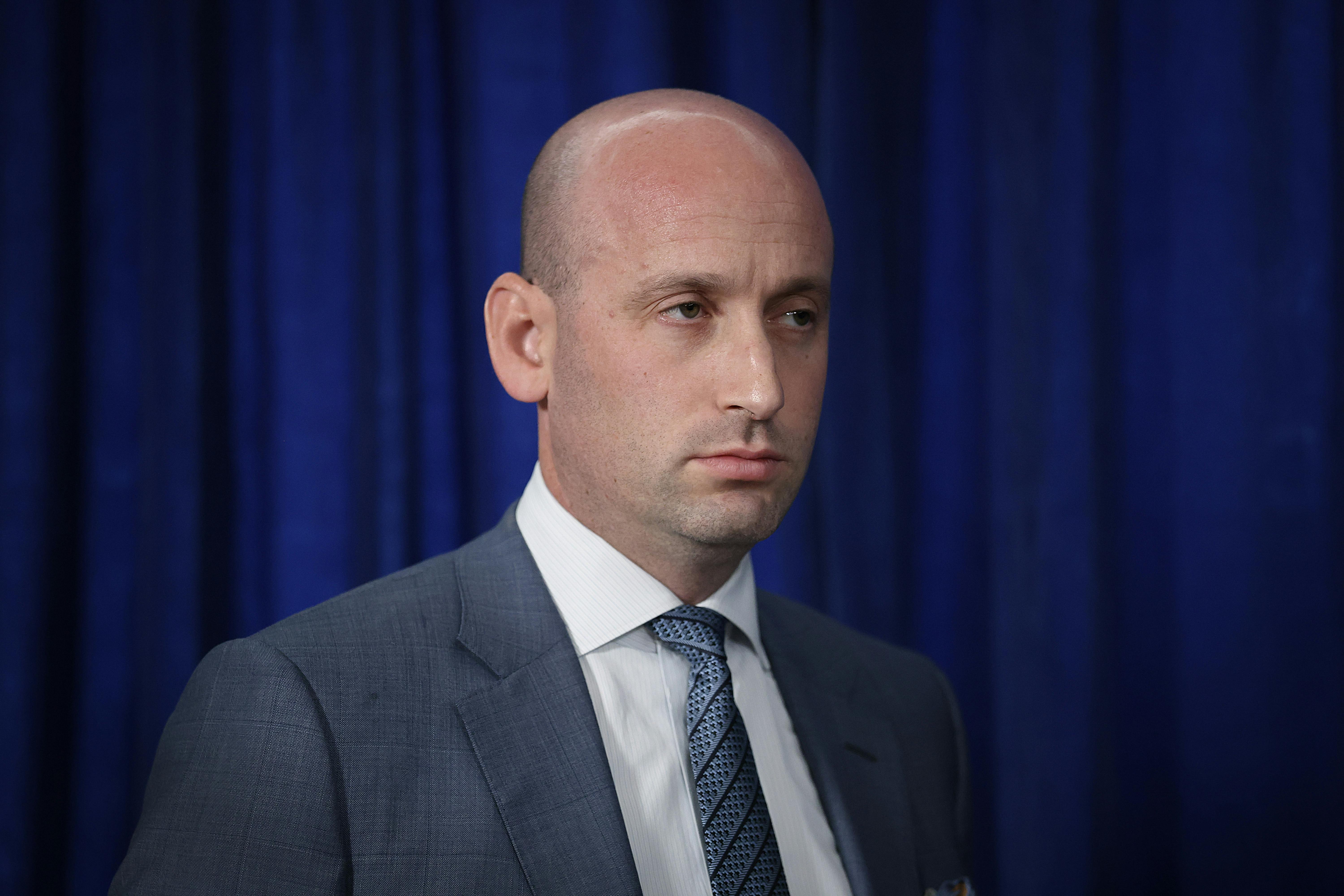 White House deputy chief of saff Stephen Miller stares off into space.