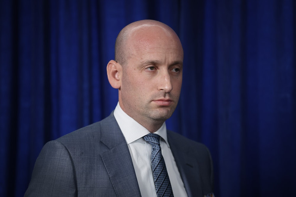 White House deputy chief of saff Stephen Miller stares off into space.