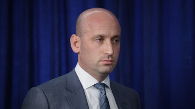 White House deputy chief of saff Stephen Miller stares off into space.