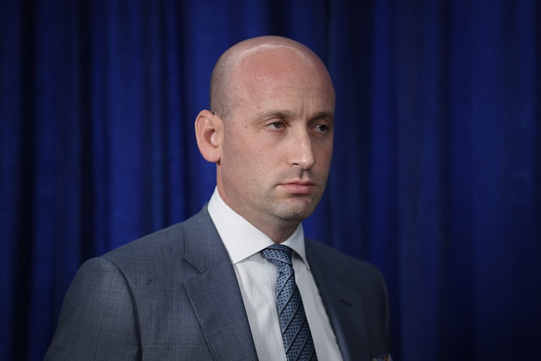 White House deputy chief of saff Stephen Miller stares off into space.