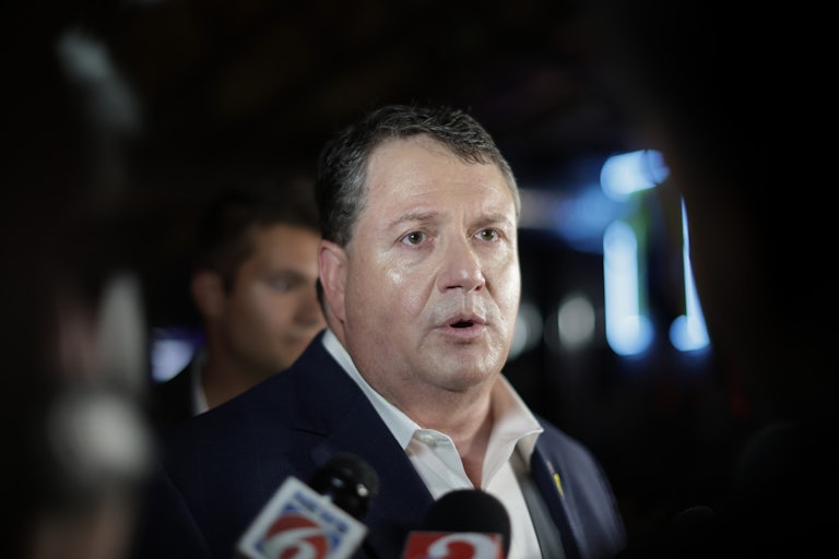 Representative Randy Fine speaks to reporters.