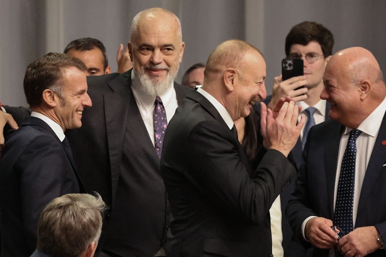 France’s President Emmanuel Macron, Albania’s Prime Minister Edi Rama, Azerbaijan’s President Ilham Aliyev, and Austria’s Chancellor Christian Stocker share a laugh at the 7th European Political Community in Copenhagen, October 2, 2025.