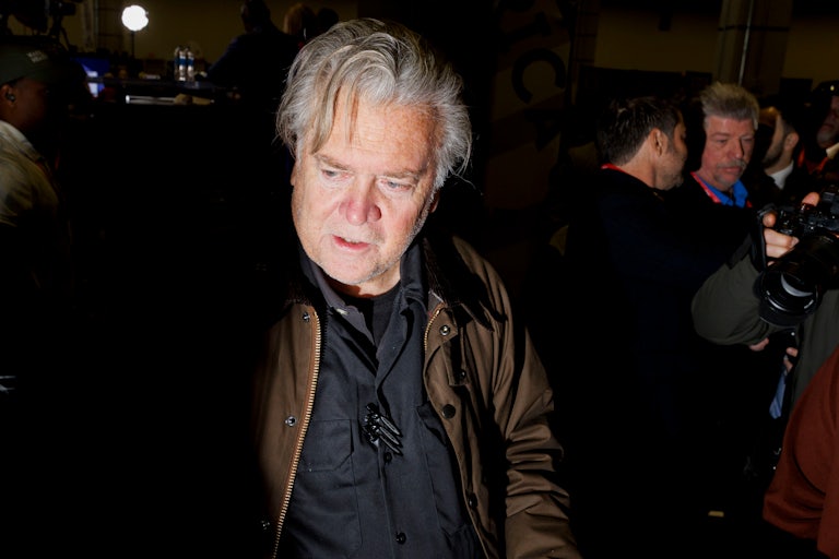 Steve Bannon speaks to reporters at CPAC