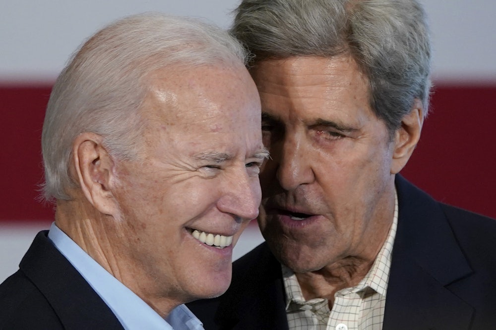John Kerry speaks to Joe Biden.