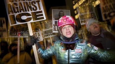 A group of anti-US Immigration and Customs Enforcement (ICE) protesters hold signs and shout slogans in downtown Minneapolis.