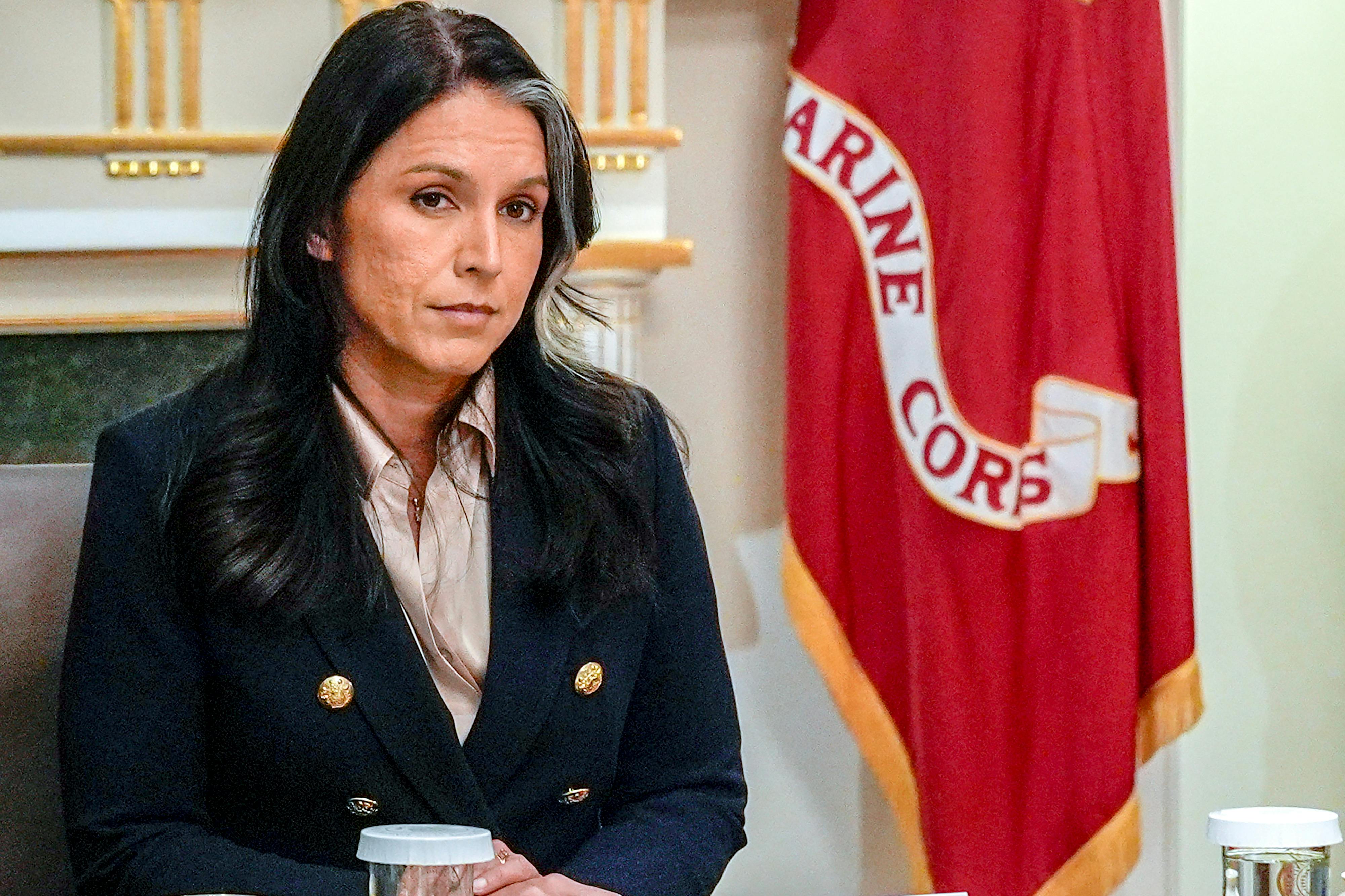 Director of National Intelligence Tulsi Gabbard sits in Donald Trump's Cabinet meeting