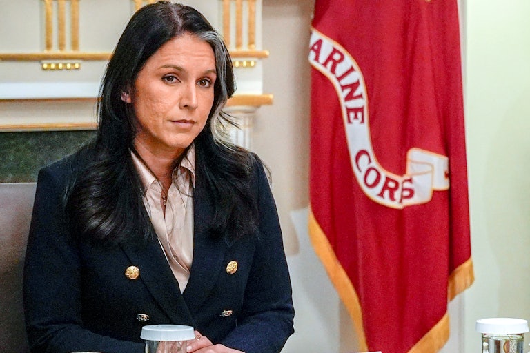 Director of National Intelligence Tulsi Gabbard sits in Donald Trump's Cabinet meeting