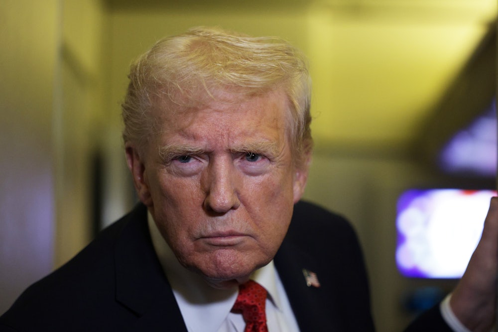 Trump listens intently