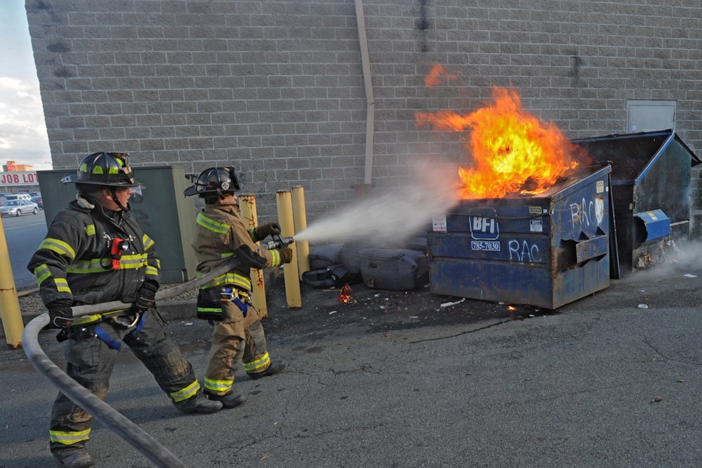 Albany firefighters put out a fire in a dumpster.