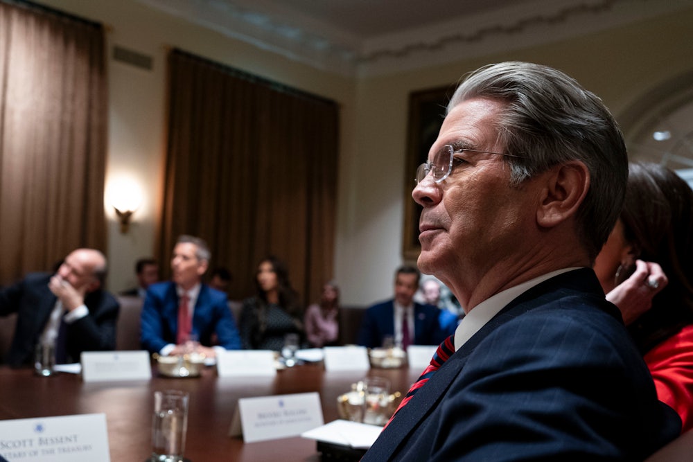 Treasury Secretary Scott Bessent sits during a cabinet meeting at the White House.