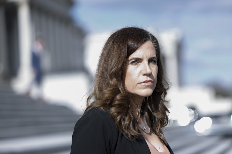 Nancy Mace looks to the side