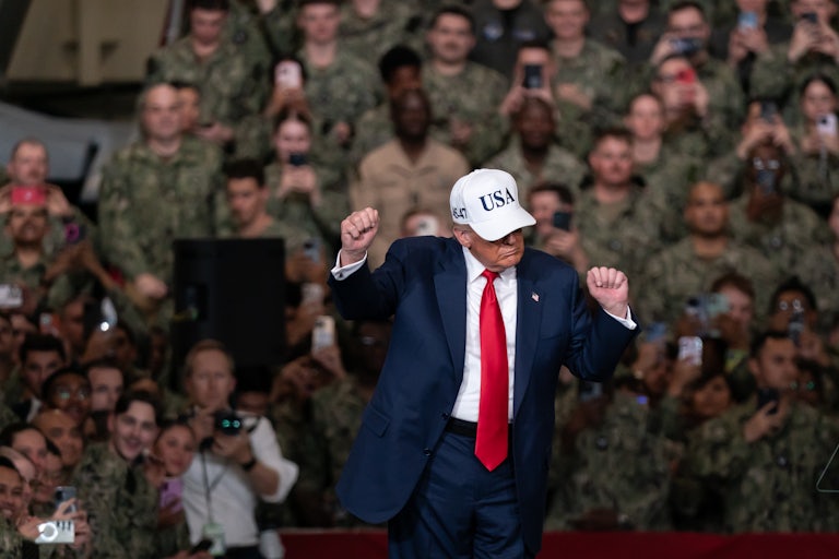 Donald Trump dances in front of troops on the USS George Washington