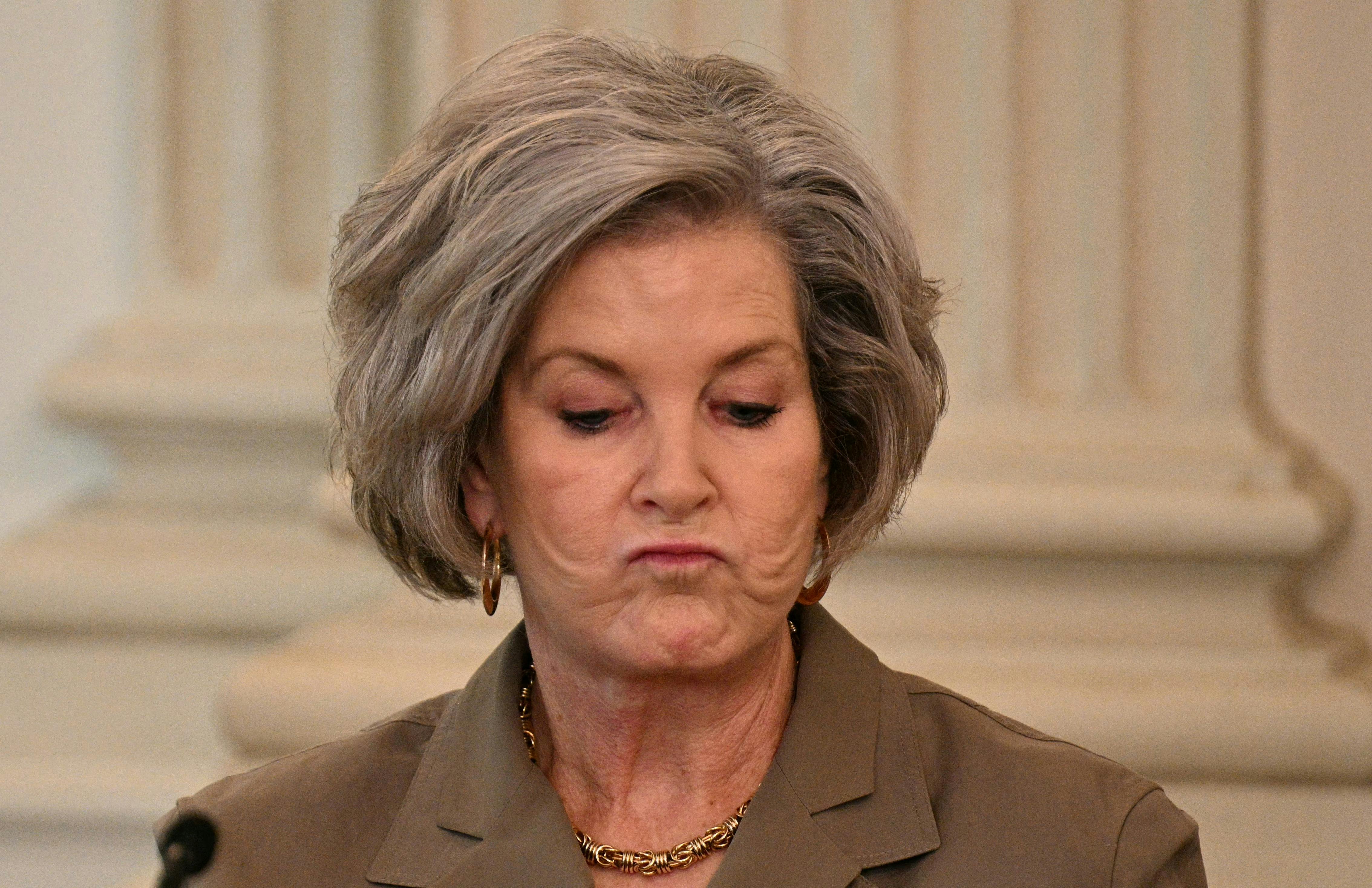 White House Chief of Staff Susie Wiles purses her lips