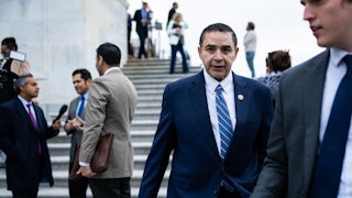 Representative Henry Cuellar walks outside the Capitol