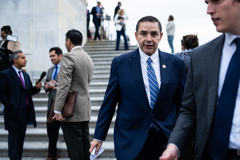 Representative Henry Cuellar walks outside the Capitol
