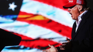 Donald Trump shouts at a rally in Arizona.