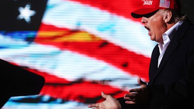 Donald Trump shouts at a rally in Arizona.