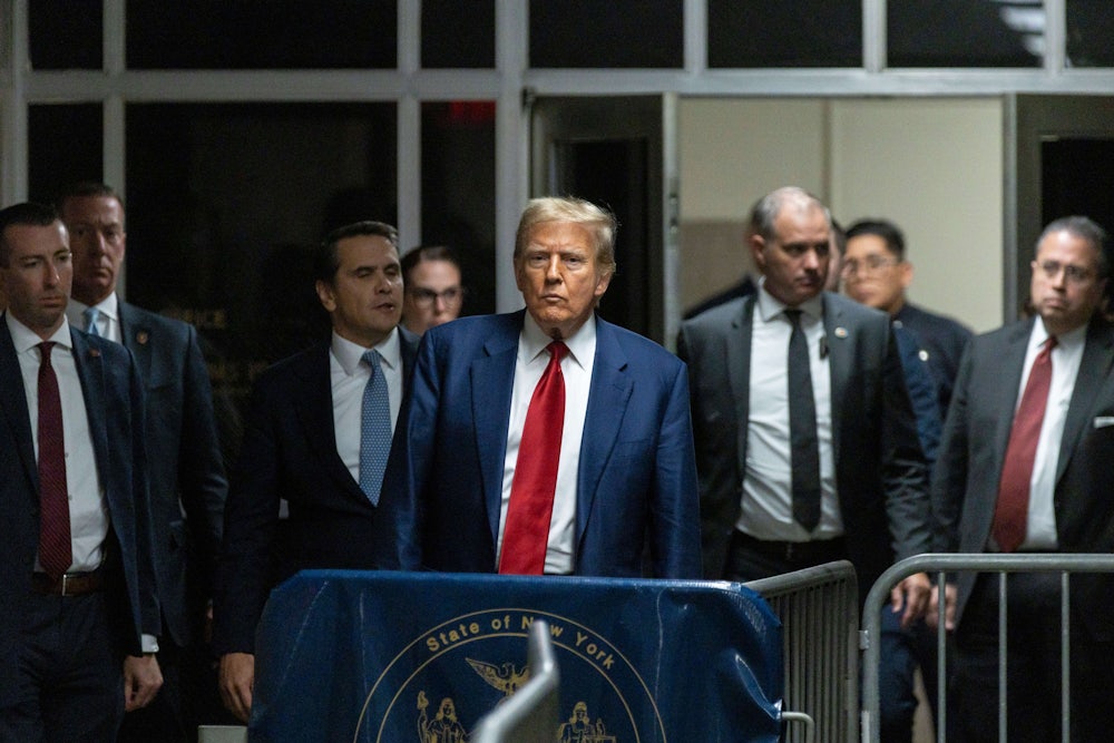 Former US President Donald Trump in the hallway outside a courtroom at Manhattan criminal court in New York.