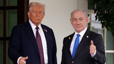 U.S. President Donald Trump and Israeli Prime Minister Benjamin Netanyahu both give a thumbs up outside the White House.