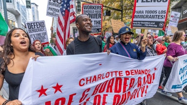Protesters attend the “No Border Patrol In Charlotte” rally on November 15, 2025, in Charlotte, North Carolina.