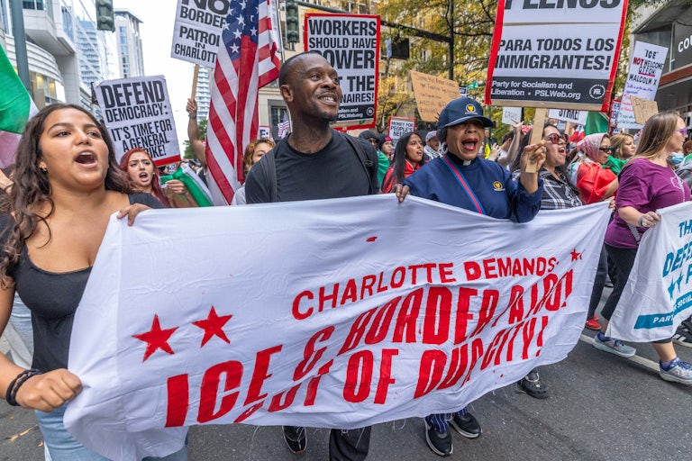 Protesters attend the “No Border Patrol In Charlotte” rally on November 15, 2025, in Charlotte, North Carolina.
