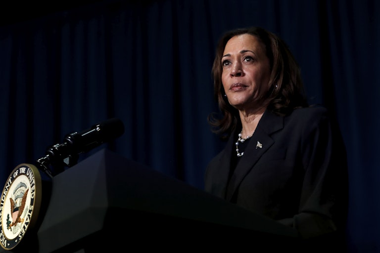 Kamala Harris stands at a podium
