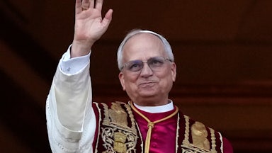 Pope Leo waves to a crowd (not pictured)
