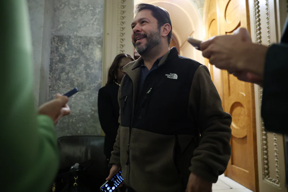 Sen. Ruben Gallego speaks to reporters during a vote at the U.S. Capitol Building.