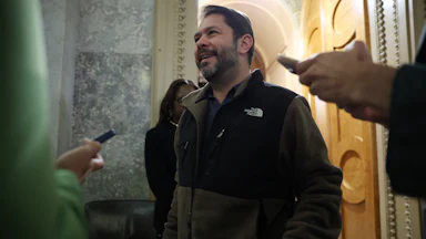 Sen. Ruben Gallego speaks to reporters during a vote at the U.S. Capitol Building.