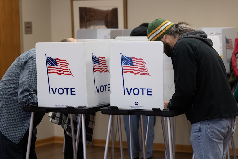 People vote at a polling station in the Wisconsin Supreme Court election