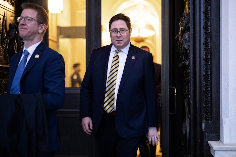 Rep. Mike Flood of Nebraska walks out of the Capitol.