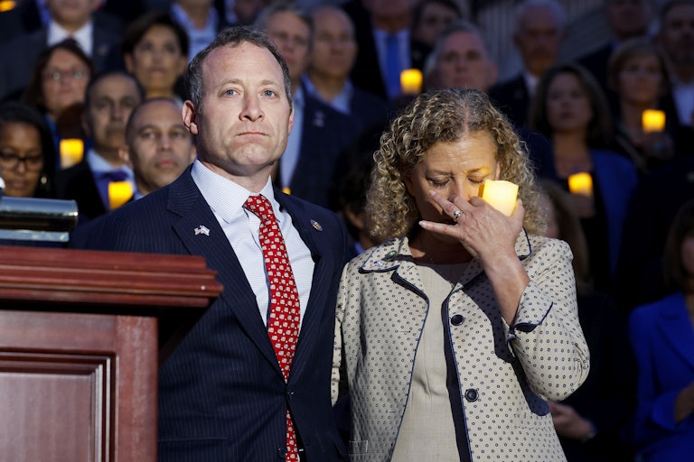 Rep. Josh Gottheimer and Rep. Debbie Wasserman Schultz during a vigil for Israel