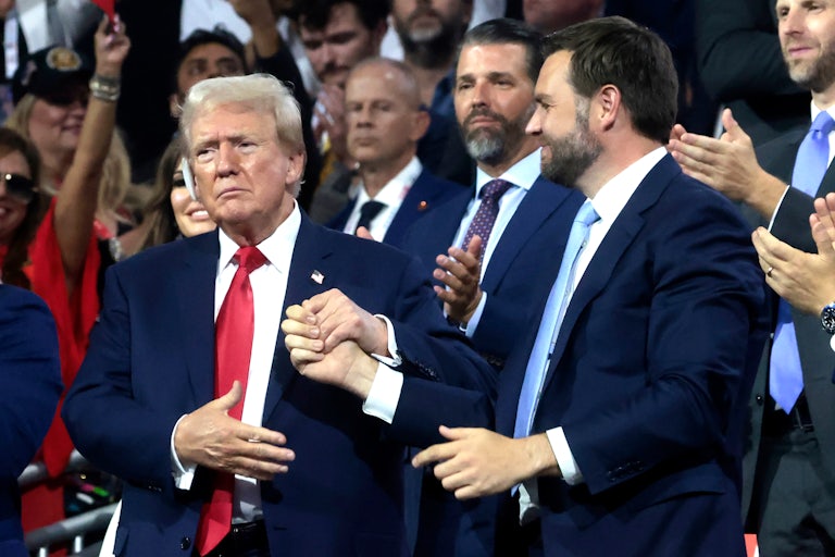 Donald Trump and J.D. Vance hold hands at the Republican National Convention